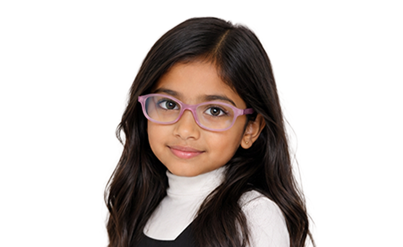 Girl wearing pink eyeglass frames